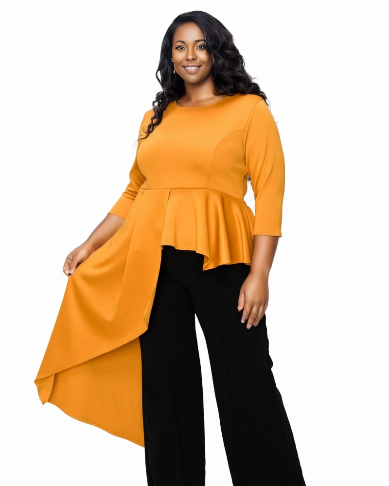 Front of a model wearing a size 1X Sanctuary Asymmetrical Peplum Top in Mustard by L I V D. | dia_product_style_image_id:315891